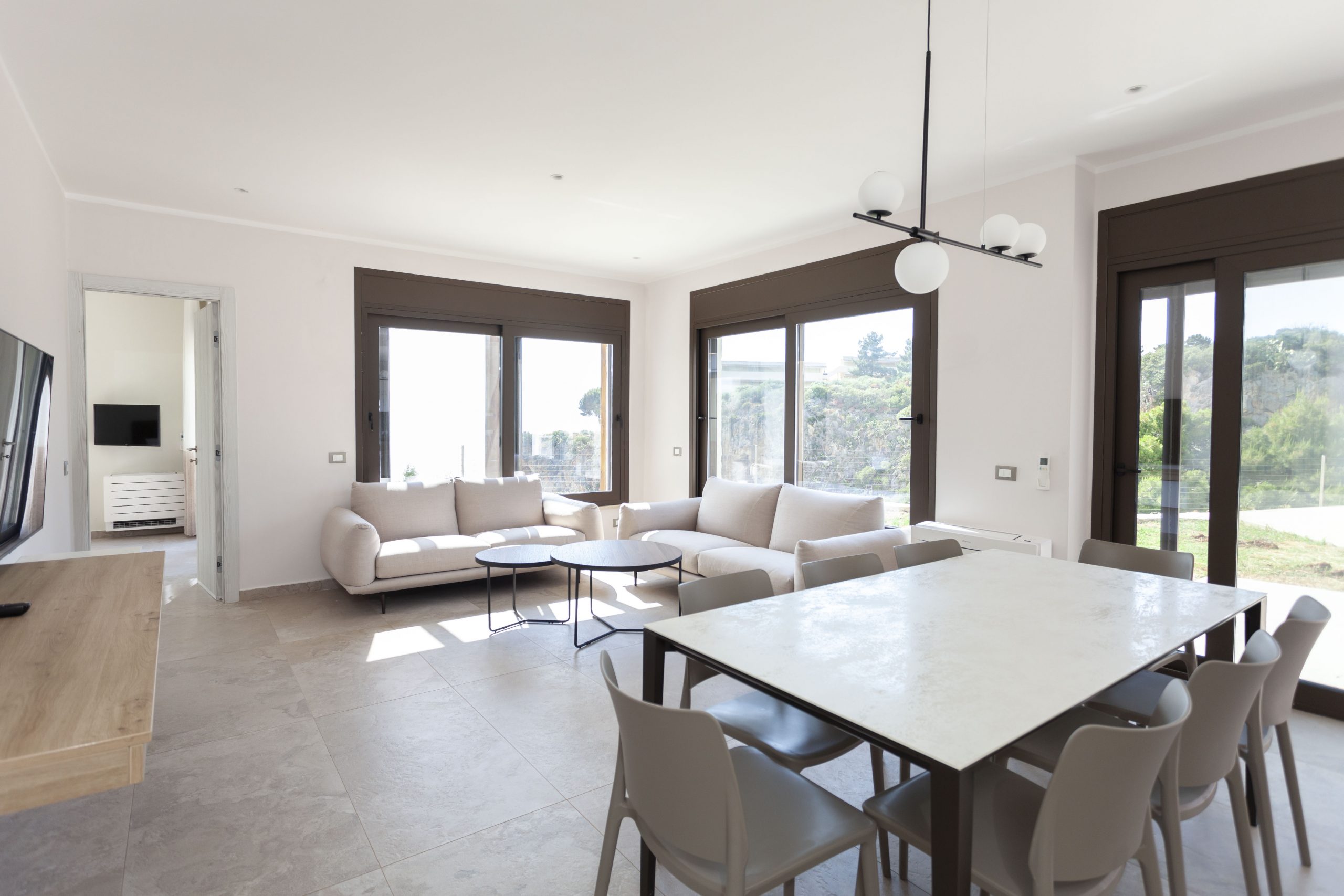 Living and dining area at Premium Villas Sicily (Palermo photo coming soon)